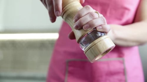 chef prepares a salmon dish in the kitchen. Close-up shots