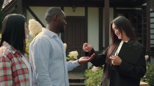 Asian Female Real Estate Agent Sells House to African Husband and Caucasian Wife and Hands Over the