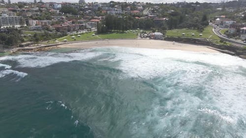 Aerial View Of Bronte Beach In Summer With Crashing Waves - Bronte Park In Sydney, NSW, Australia.