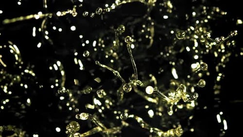 Abstract Gold Liquid Splashing in Slow Motion