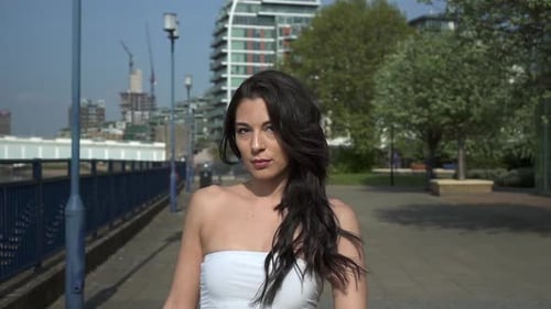 Confident Woman Walking in Urban City Environment