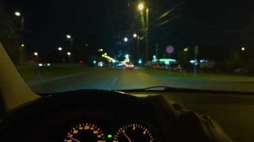 Enjoy an Exhilarating Nighttime Drive Through Beautifully Illuminated City Streets in Stunning
