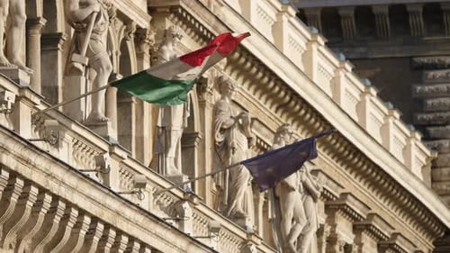 Italian Flag and EU Flag on Building Facade