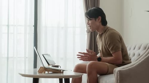 Young Adult on Video Call at Home