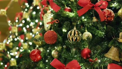 Ornate Christmas Tree with Shiny Baubles and Red Bows