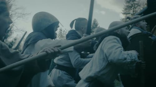 Large-Scale Medieval Battle Reenactment. Violent Tribe of Warriors Attack Wooden Fortress Wall, The