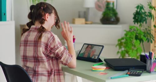 Young Women Video Call on Tablet Device