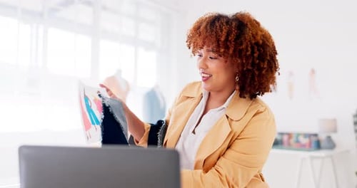 Fashion, design and black woman on video call with laptop at workshop talking to client online