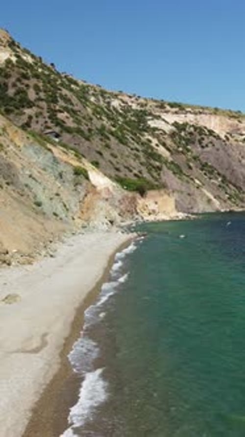 Aerial Vertical View of Seascape with Crystal Clear Azure Sea and Rocky Shores A Beautiful Lagoon on