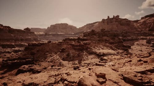 Alien Landscape Featuring Stratified Rocks Under Lightcolored Sky