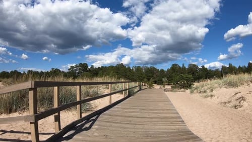 Wooden Eco Trail Through Sand Dunes on the Beach