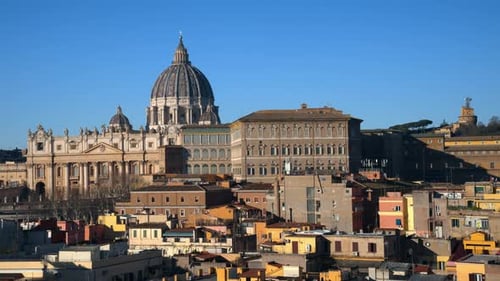 Aerial view of Vatican city from the distance. Saint Peter's Basilica at sunset. Zoom in effect. Rom