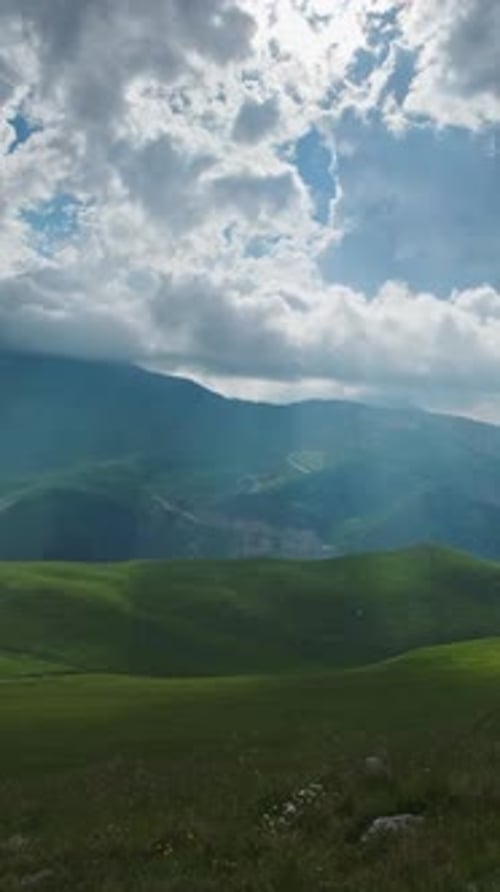 Mountain landscape with sun rays