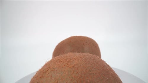 Kiwi close up on white background isolated 4K