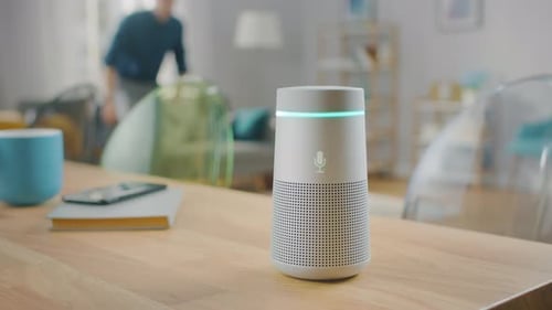 Smart home device sitting on wooden table