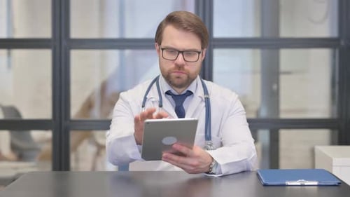 Doctor Using Digital Tablet in Hospital