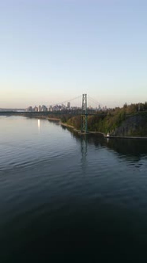 Aerial View of Lions Gate Bridge and Stanley Park at Dawn Canada