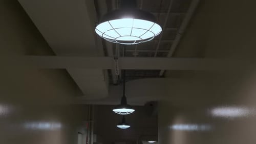 Basement of the Hospital Storage of Items Warehouse By Cells and Outdoor Light at the End of the