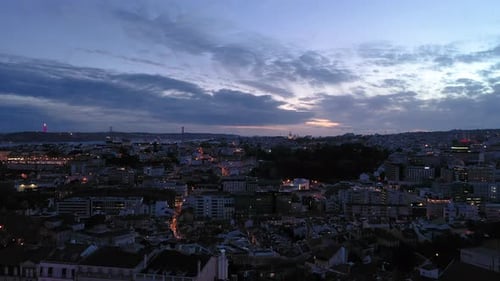 Lisbon Skyline and Tagus River at Night Blue Hour Aerial View