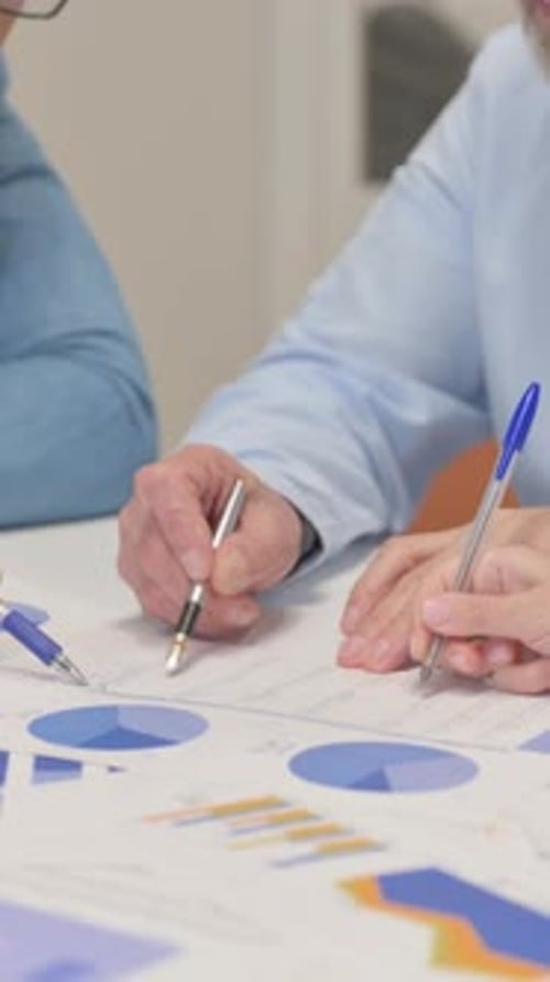 Close up of Office Work by Mixed Race People, vertical video