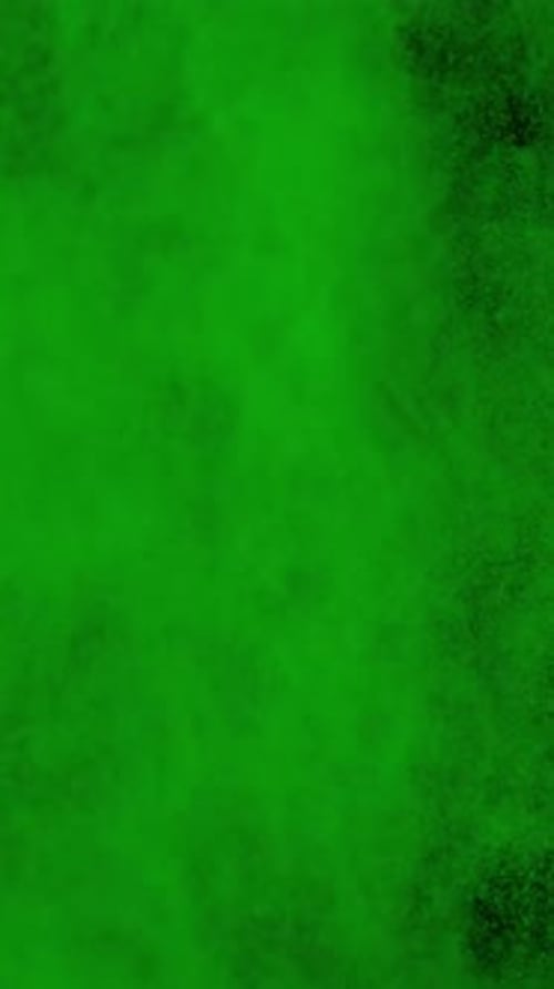 Expanding Green Powder on Black Background Portrait