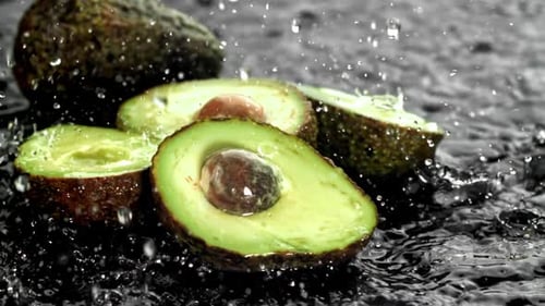 Super Slow Motion Fresh Avocado with Splashes and Drops Filmed on a Highspeed Camera at 1000 Fps