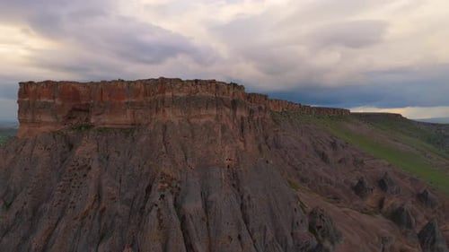 drone flyover showing the extensive geological plateau above Selime Cathedral rock monastery. Vast