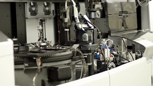 Automated Testing Machine Performs Tasks in a Lab