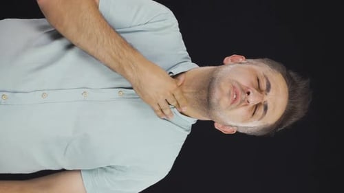Adult Man Scratching Sore Throat