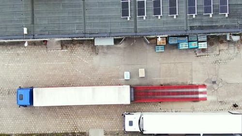 Aerial Logistics Industrial Truck Loading and Warehouse Solar Infrastructure