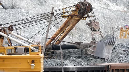 Mechanical Shovel Digging in Stone Quarry