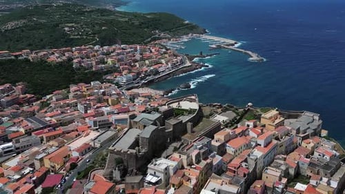 Aerial View Coastal Town with Historic Castle and Harbor on Mediterranean Shore