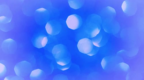 Les lumières bokeh bleues brillent de mille feux
