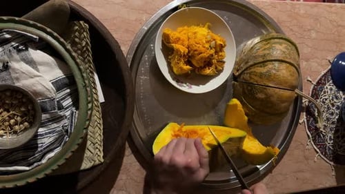 Slice ripe delicious squash butternut pumpkin chopping in small size in kitchen home made dessert so