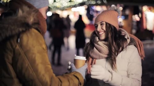 Loving Couple Embracing At Night In Festive City