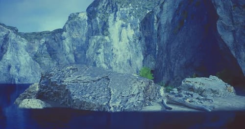 Exploring the Serene Beauty of Rocky Cliffs and Tranquil Waters at Dusk