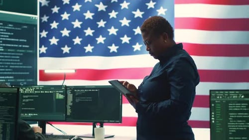 Woman Uses Tablet With American Flag Background