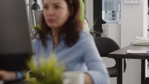 Women Working in Modern Corporate Office Space