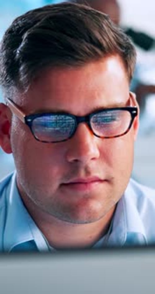 Coding, computer and glasses with programmer man at desk in office for software development