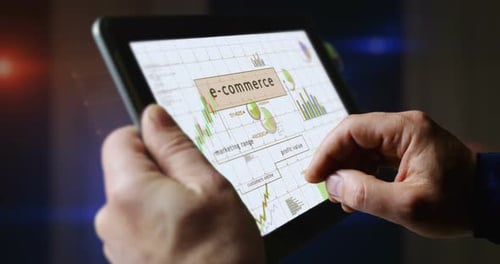 Ecommerce online business charts graphs on touchscreen pad display