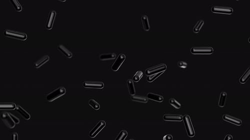 Abstract Black Capsules Floating and Rotating in Dark Space