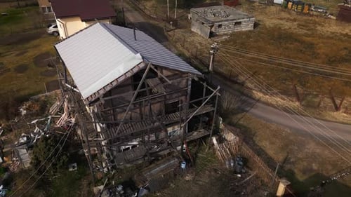 Building a House in Rural Area with Grassy Landscape