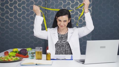 Smiling Nutritionist Measuring Healthy Food at Workplace