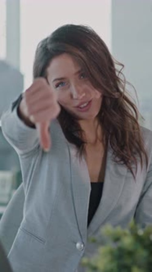 A Professional Woman Working Diligently in a Contemporary Office Setting with Style