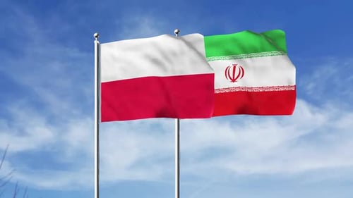 Waving Flags of Poland and Iran Against Blue Sky
