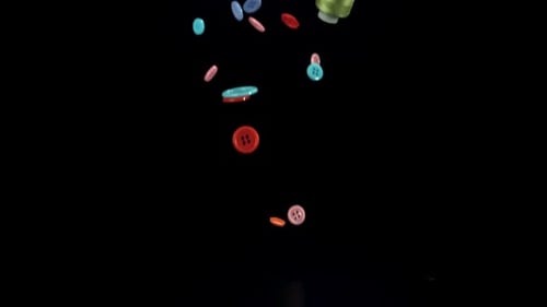 Colorful Sewing Accessories Falling in Slow Motion