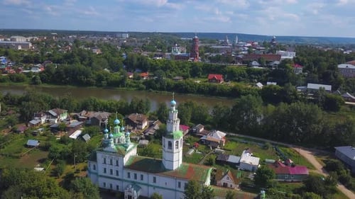 Top view of town with old churches by river