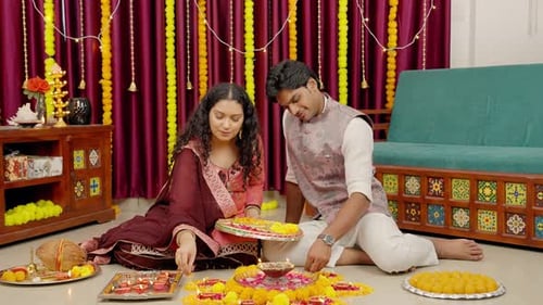 Couple Preparing Decorations for Hindu Religious Ceremony