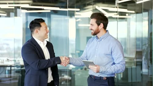 Two men handshake, business people meeting for success deal in office. b2b teamwork finance company