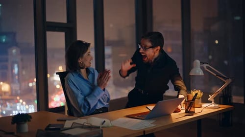 Amazed Winners Celebrating Business Success Browsing Laptop Night Office Closeup